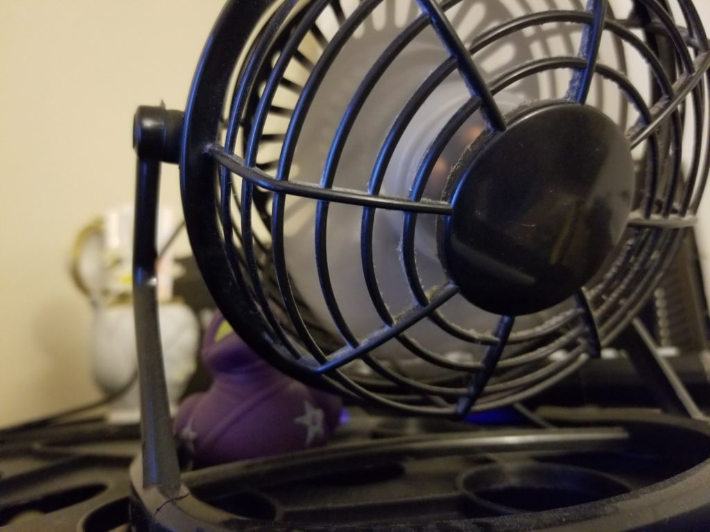 Small desk fan... with a ninja in the background?!